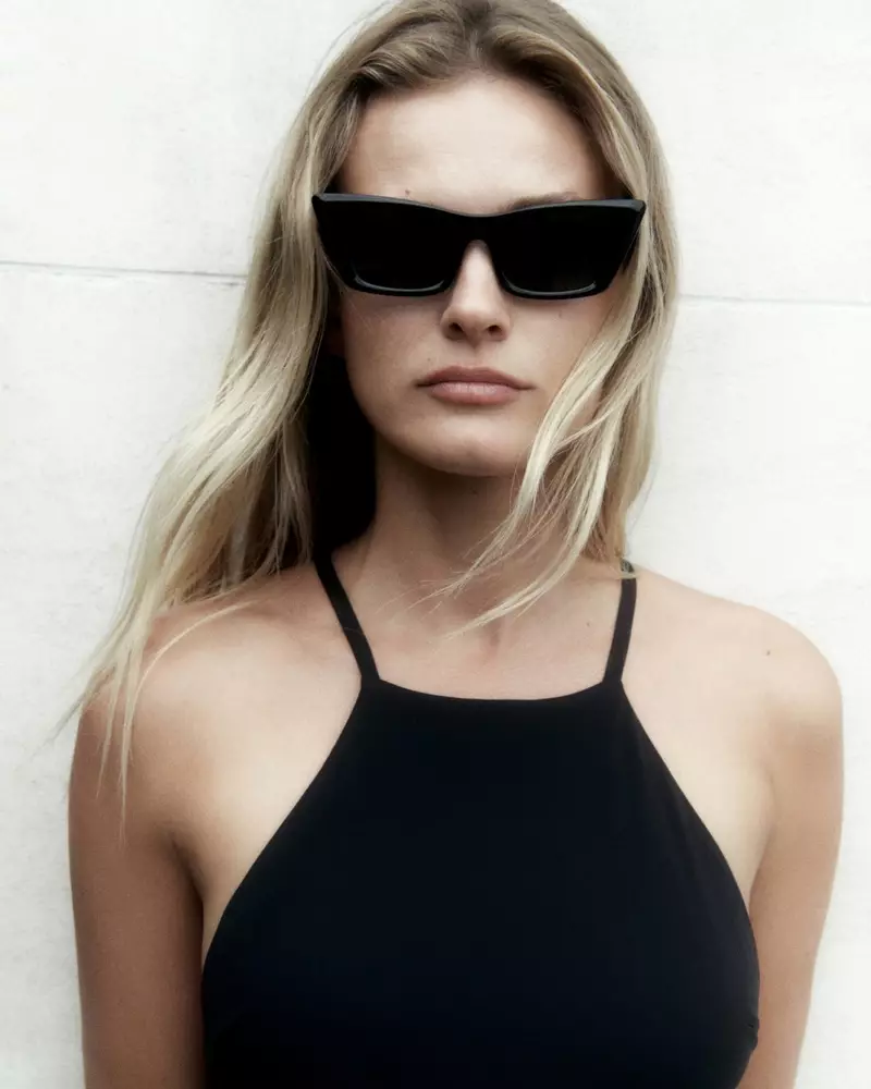 Edita Vilkeviciute Massimo Dutti kincên avjeniyê yên stûyê halter û berçavkên rojê yên cateye.