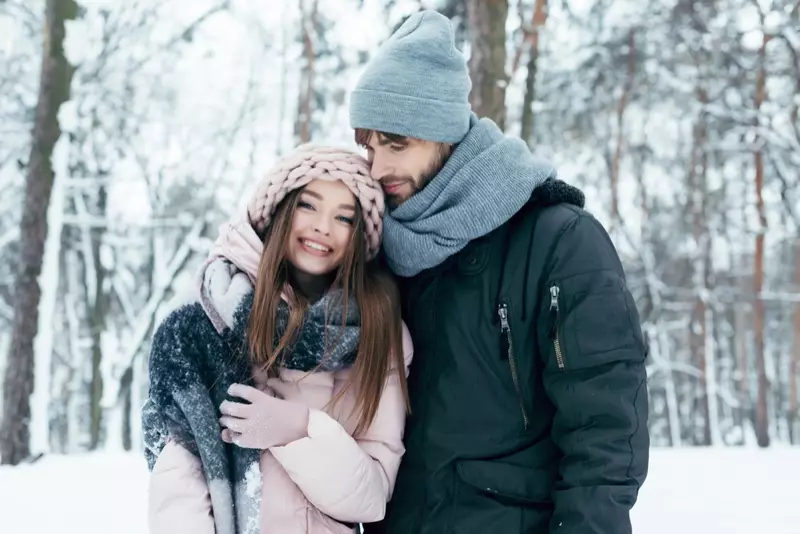 Couple Outdoors Snow Smiling Jacket Hats