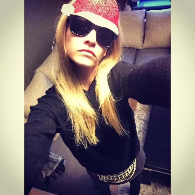 Ginta Lapina Rocks Santa Hat