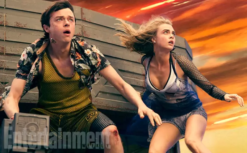 Dane DeHaan u Cara Delevingne jidhru fil-periklu fuq is-sett tal-film Valerian. Ritratt: EW