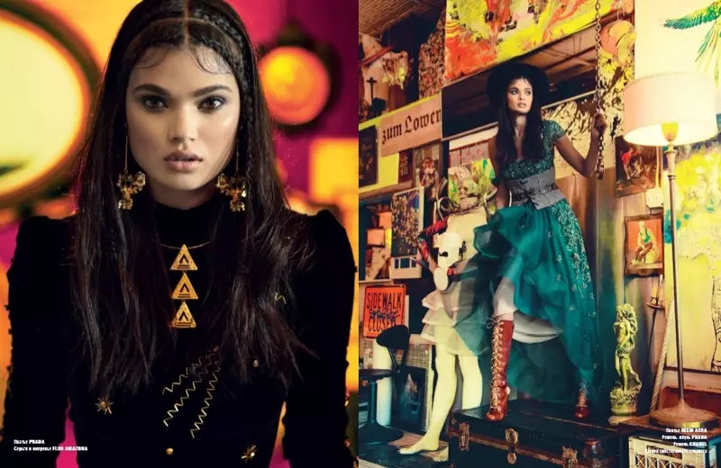 (Chapda) Daniela Braga baxmal Prada libosida suratga tushmoqda (o‘ngda) Model Prada korset va etikli Reem Acra libosida