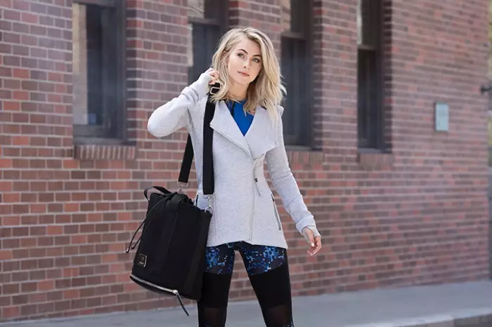 Julianne Hough kyakkyawan hangen nesa ne a cikin jaket ɗin asymmetrical da leggings daga MPG ta Julianne Hough Collection.