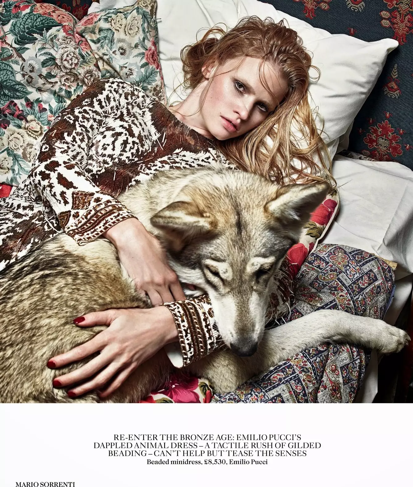 Lara Stone Poses with Fur, Wolfs for Mario Sorrenti Shoot in Vogue UK