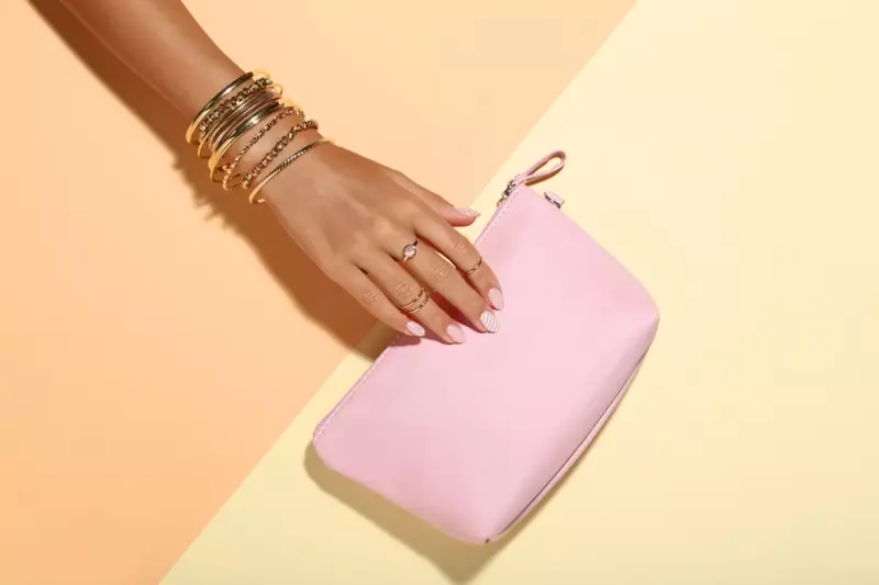 Model's Hand Gold Bangles Bag Pink