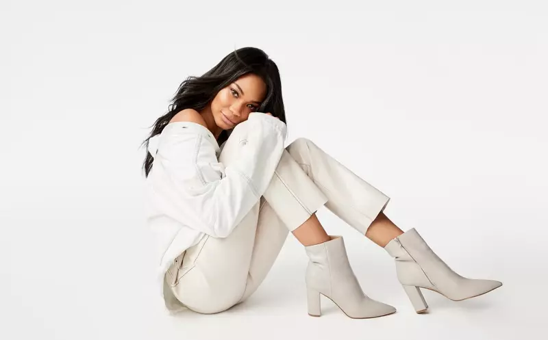 Model Chanel Iman draacht Ulani-laarzen yn 'e kampanje fan Marc Fisher LTD hjerst-winter 2019