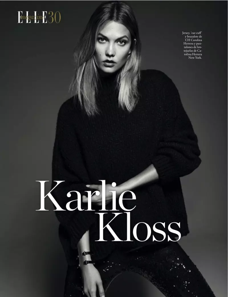 Karlie Kloss zeigt eine tolle Pose und modelliert CH Carolina Herrera Jersey-Pullover und Carolina Herrera-Hosen