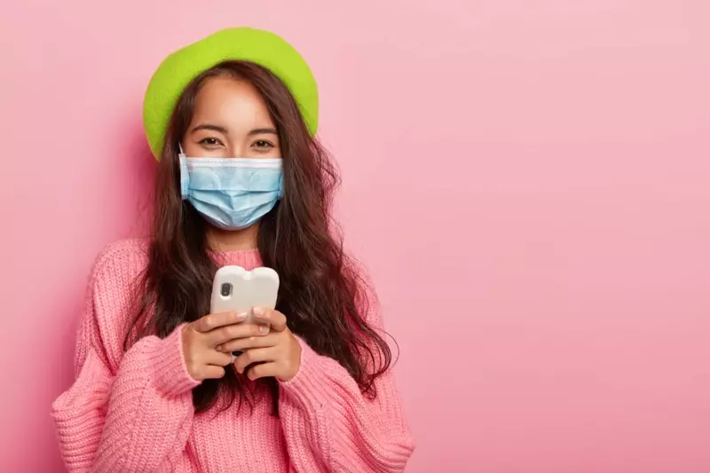 Brunette Woman Stylish Pink Sweater Phone Face Mask