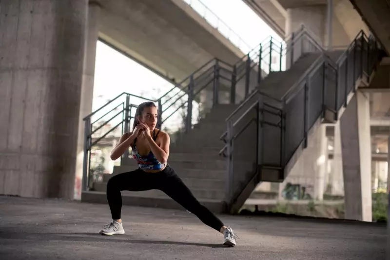 Fit Woman Exercising Outdoors