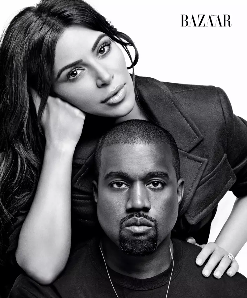 Kim Kardashian poseeraa aviomiehensä Kanye Westin kanssa Prada-takissa