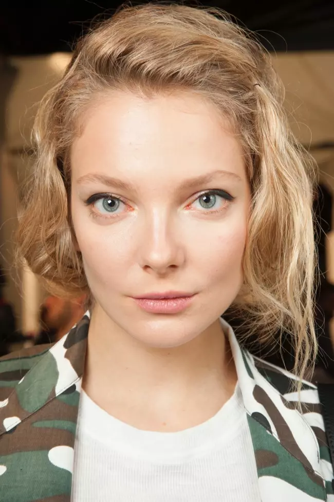 Eniko Mihalik stuts backstage