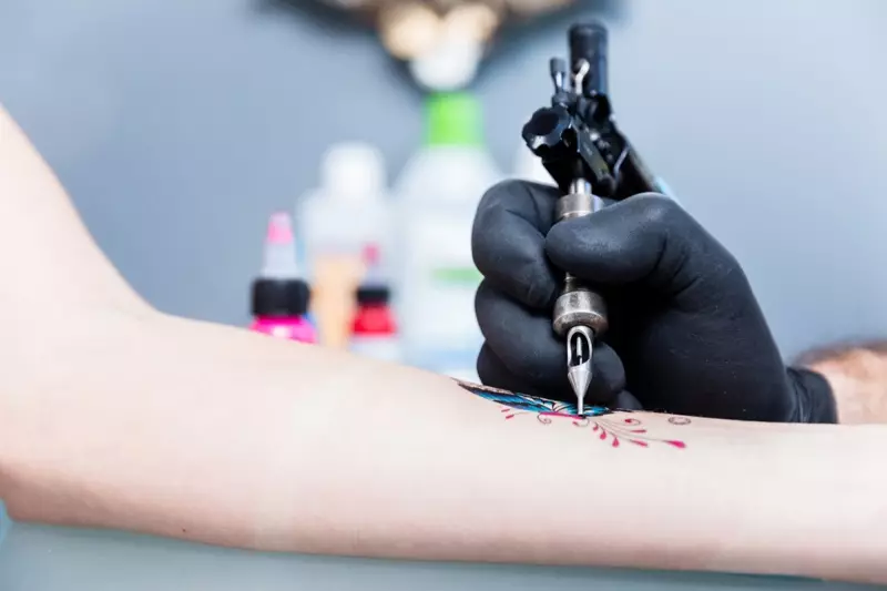 Frou Getting Butterfly Tattoo Arm